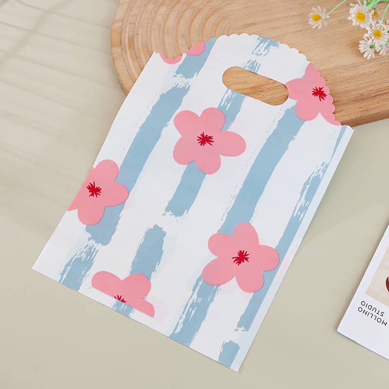 50pcs, 4 Styles Stripe Heart Smile wavy handle PVC gift bag