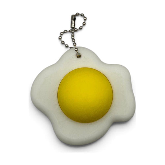 3D Egg Yolk Clicker Keychain Fidget Toy - The Sensory