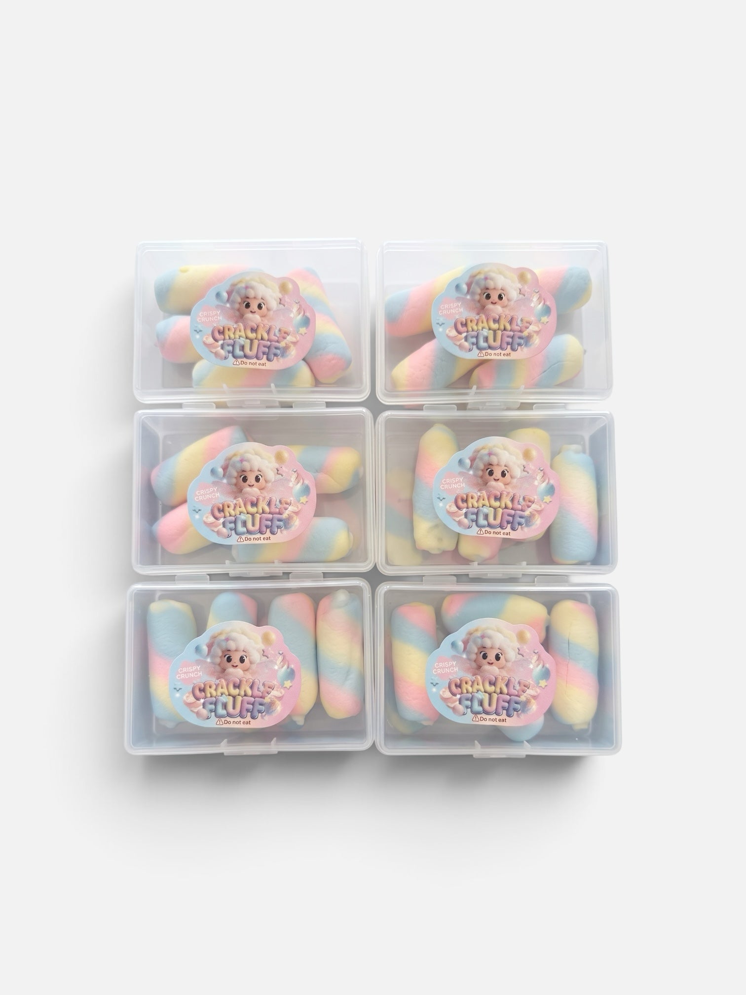 Le Sage May Crackle Fluff sensory fidget toys in pastel pink, blue, and yellow swirls, packed in clear storage cases.