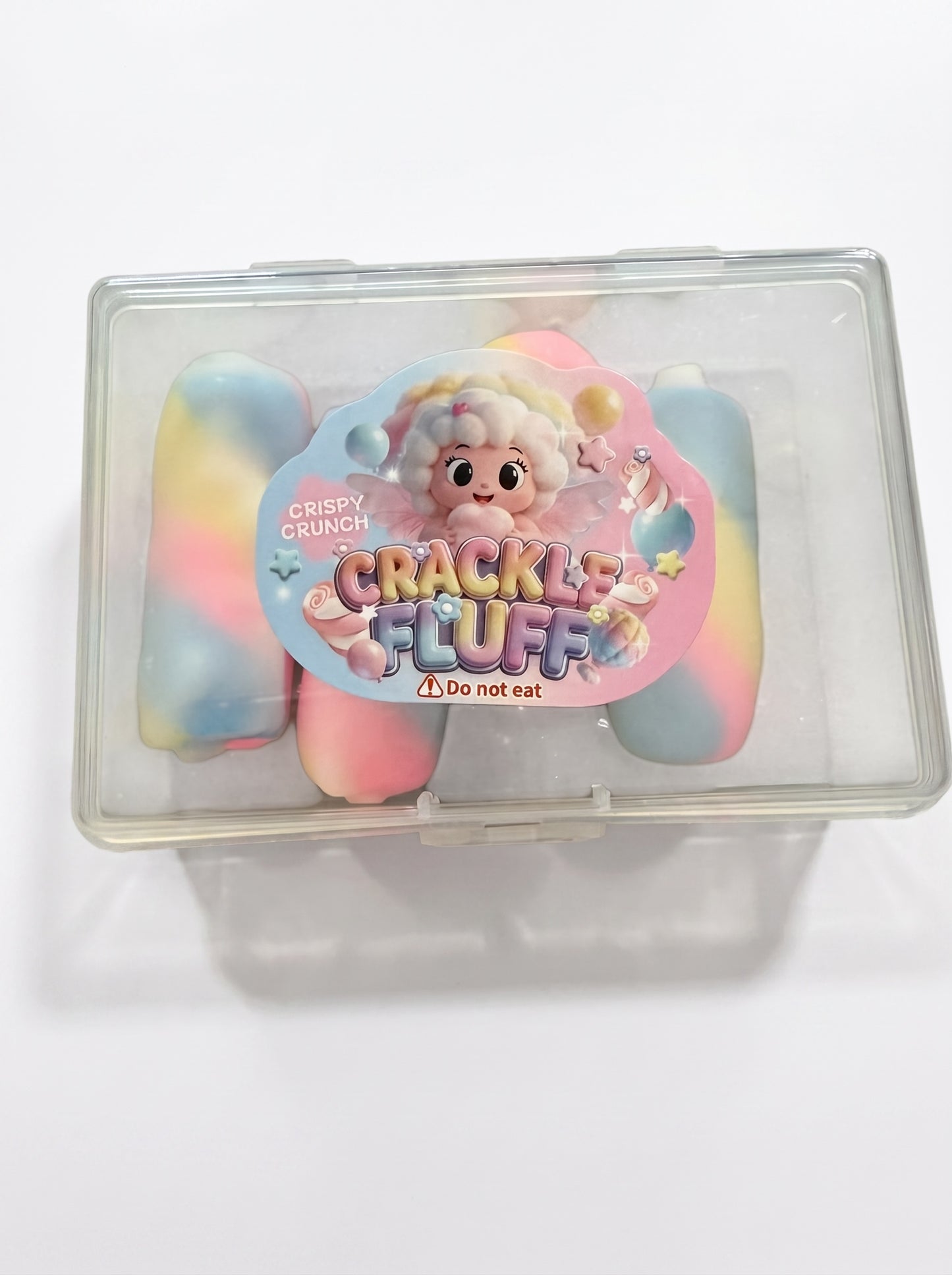 Le Sage May Crackle Fluff sensory toy set featuring pastel pink, blue, and yellow squishy fidgets in a storage case.