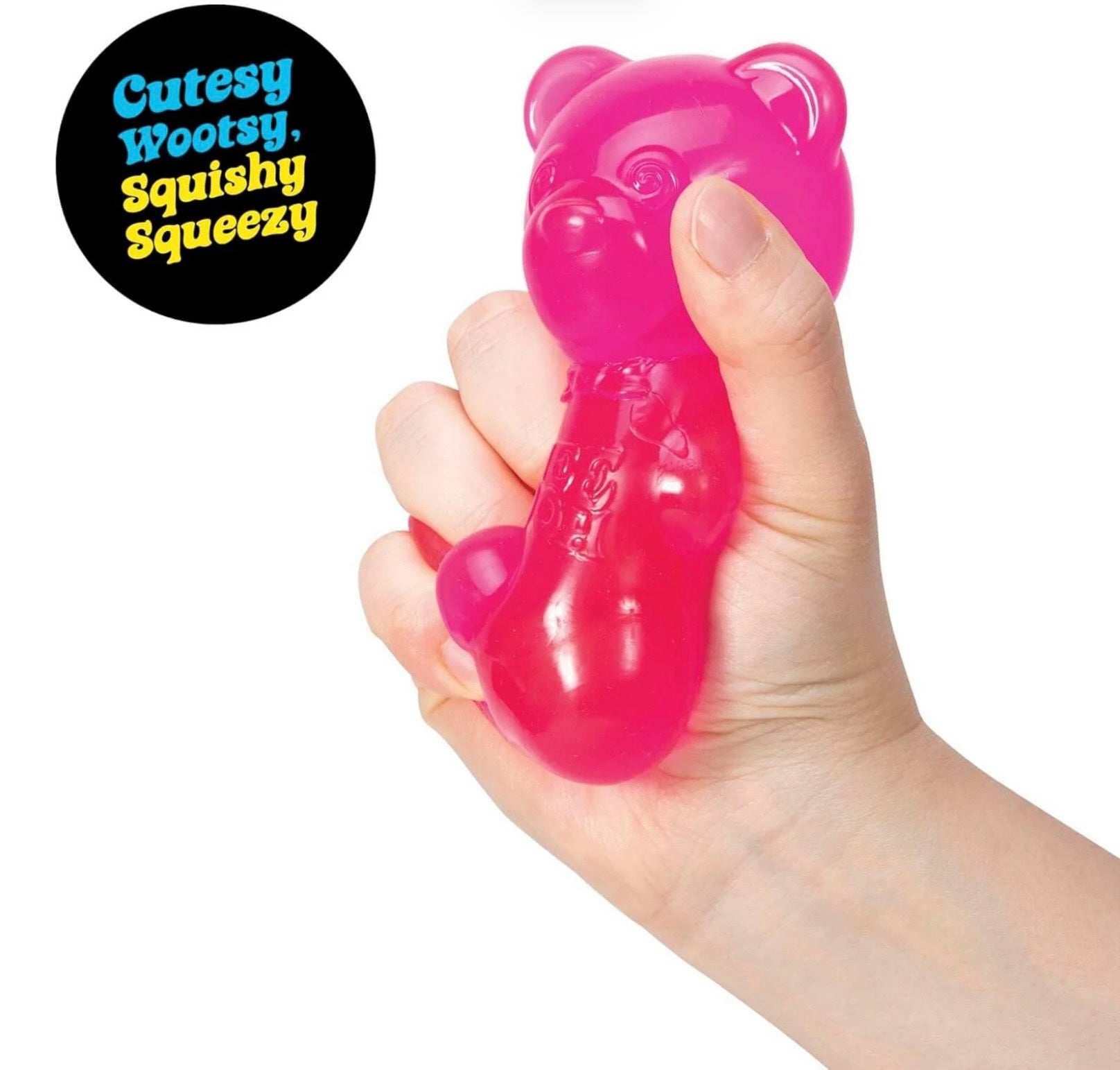 Le Sage May Schylling NeeDoh pink translucent gummy bear sensory squeeze toy being held in a hand